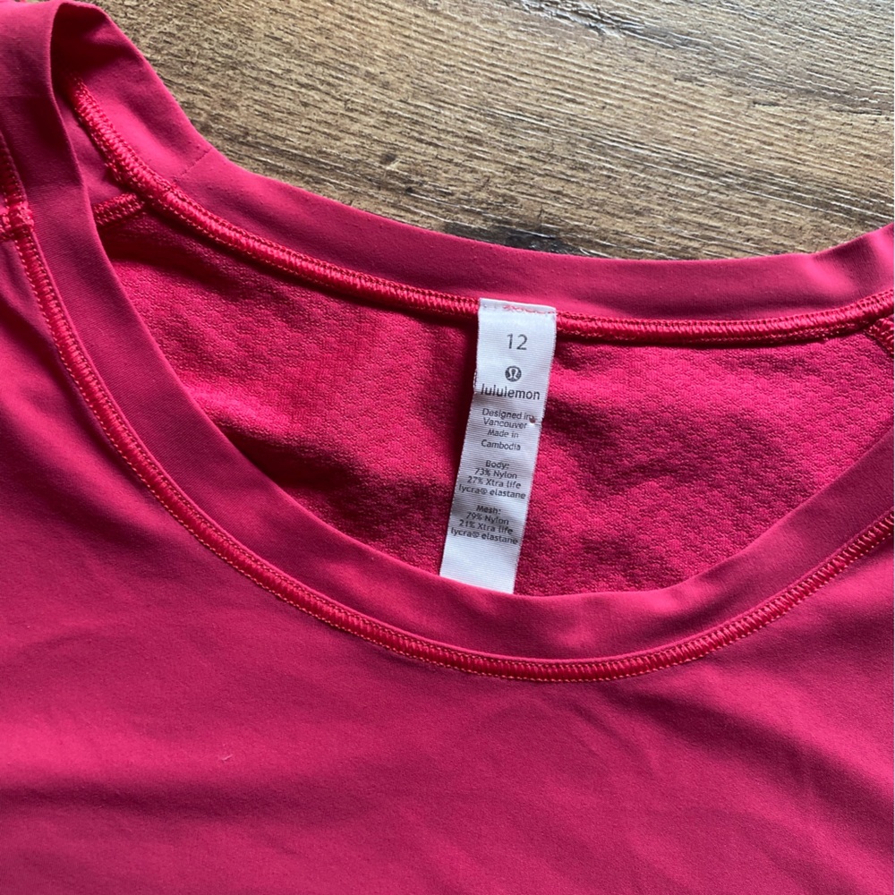 Lululemon Quick Pace Short Sleeve
Fuchsia Pink Size 12 - Picture 4 of 5